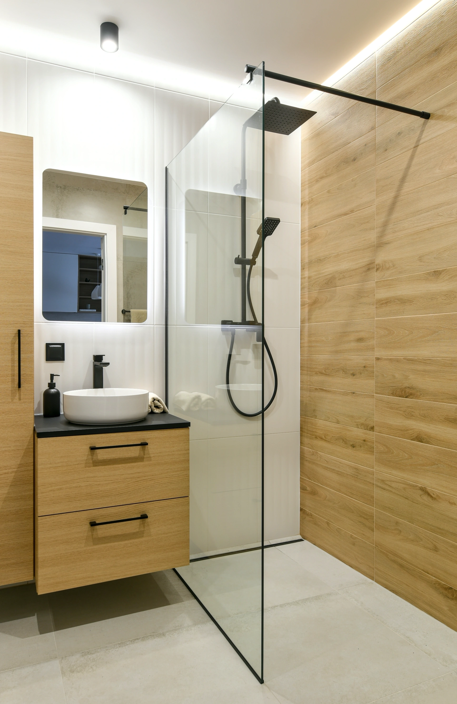 White tile and timber-accent walk-in shower